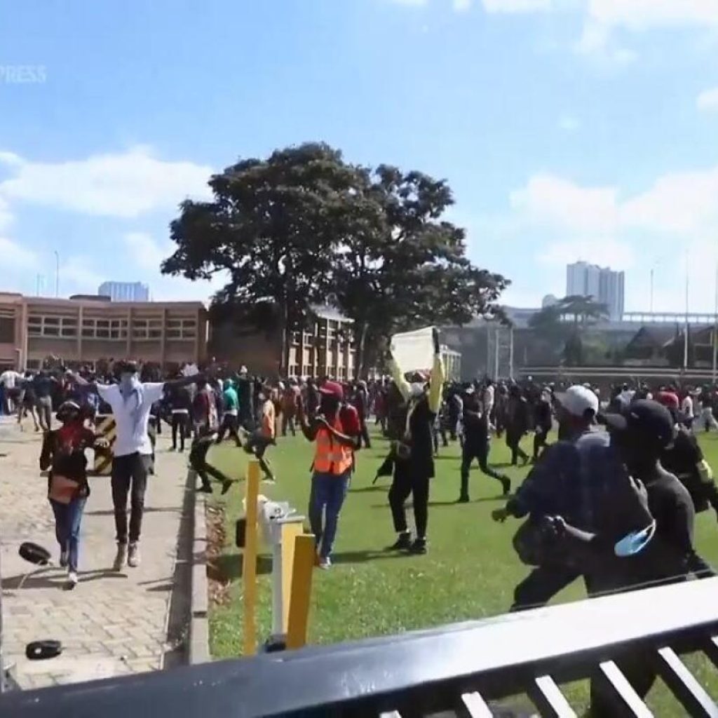 Anti-tax protesters enter Kenya’s parliament as clashes with police intensify, resulting in deaths | AP News