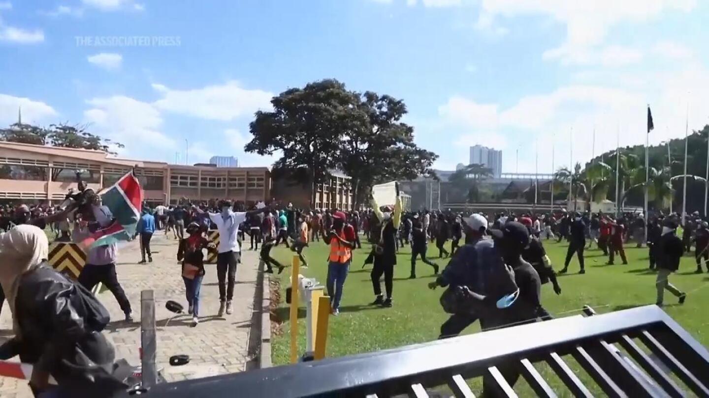 Anti-tax protesters enter Kenya’s parliament as clashes with police intensify, resulting in deaths | AP News