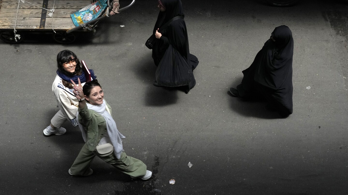 As Iran’s presidential vote looms, tensions boil over renewed headscarf crackdown