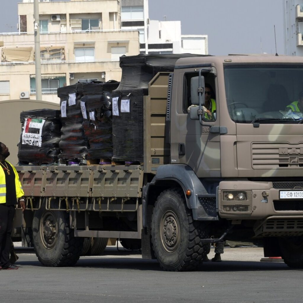 Gunfire, lawlessness and gang-like looters are preventing aid distribution in Gaza, an official says