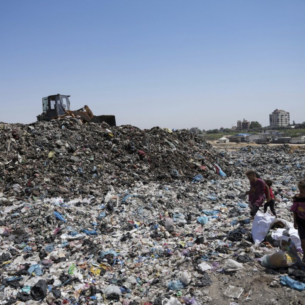 In the searing heat of the Gaza summer, Palestinians are surrounded by sewage and garbage