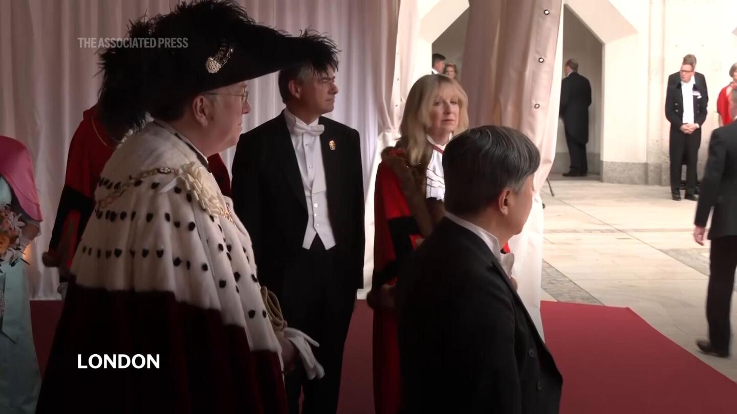 Japan’s Emperor Naruhito given grand welcome for banquet in London | AP News