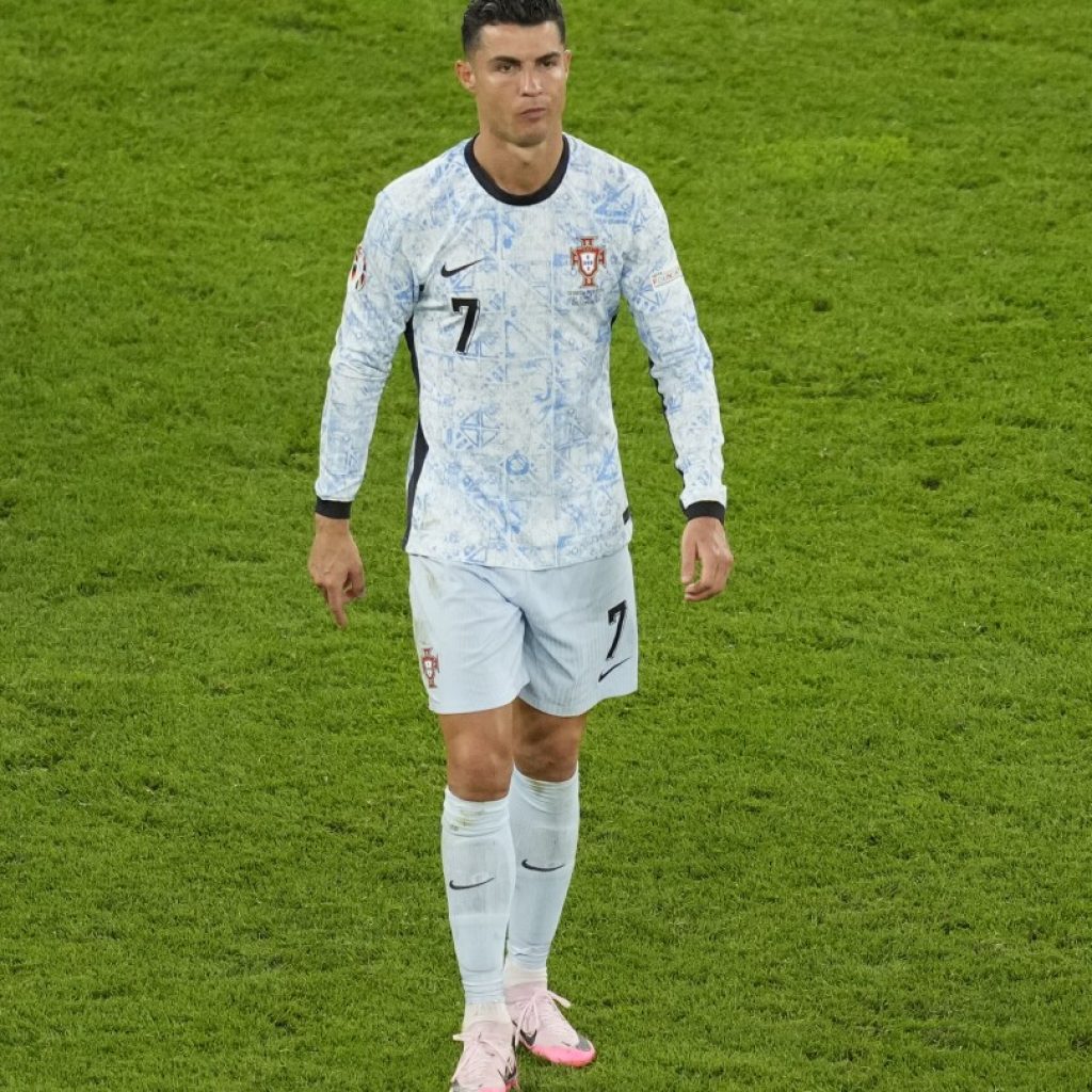 Cristiano Ronaldo just avoided being hit by a fan who jumped from the crowd to get to him at Euros