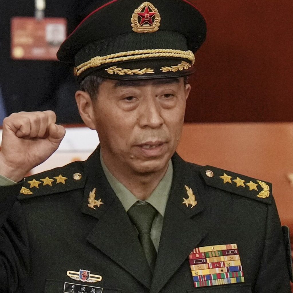 Former Chinese defense minister expelled from ruling Communist Party over graft allegations