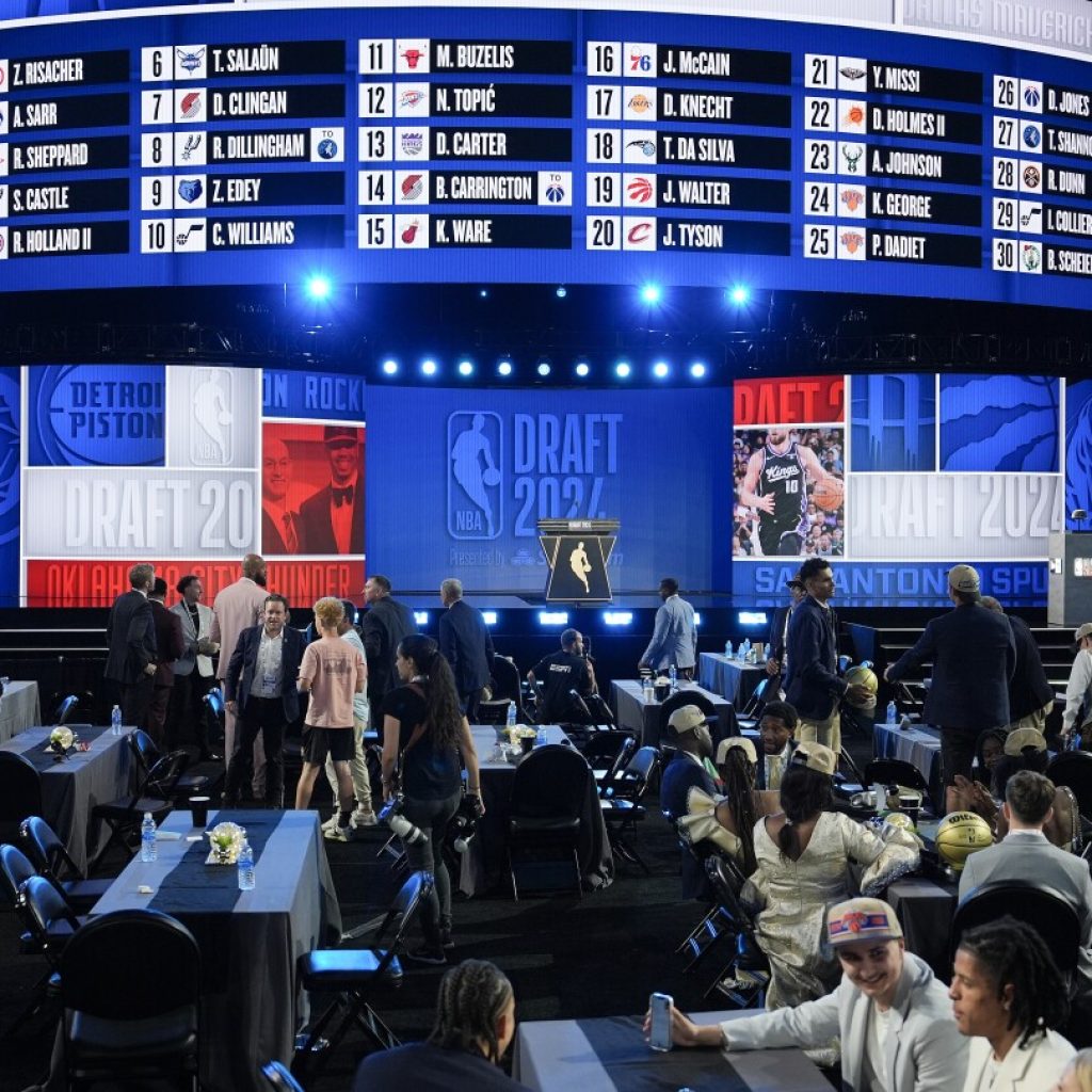 NBA draft resumes for the second round on a new day at a new site