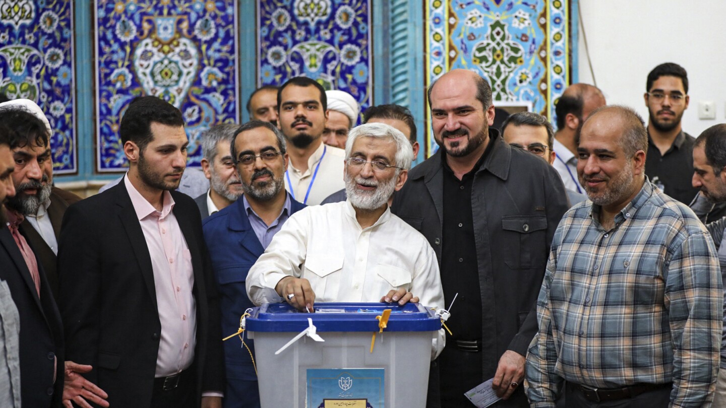 Iran seesawing vote results put race between reformist Masoud Pezeshkian and hard-liner Saeed Jalili