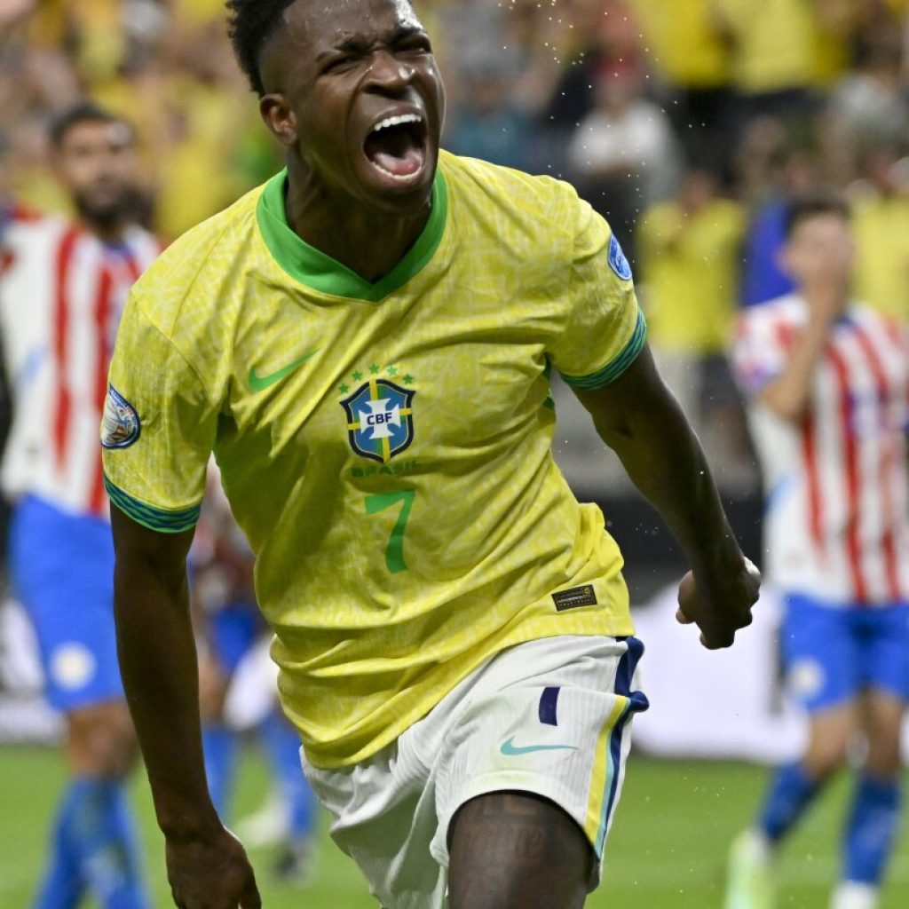 Junior scores twice to lead Brazil to 4-1 win over Paraguay in Copa America group stage