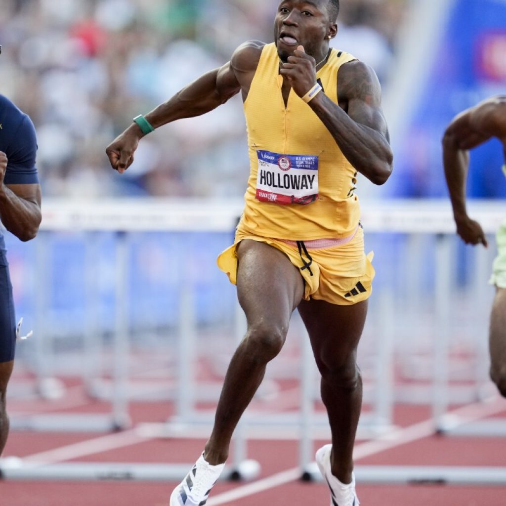 Olympics and unfinished business await for hurdler Holloway while Sha’Carri and Lyles keep blazing