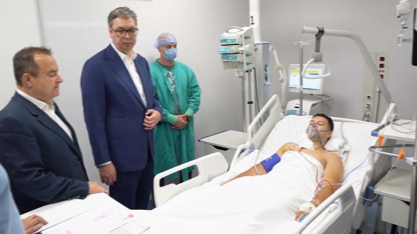 Serbia president visits police officer who was injured in attack at Israel embassy | AP News