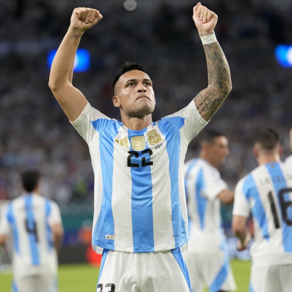 Lautaro Martínez scores twice and Argentina playing without Messi beats Peru 2-0 to end group play