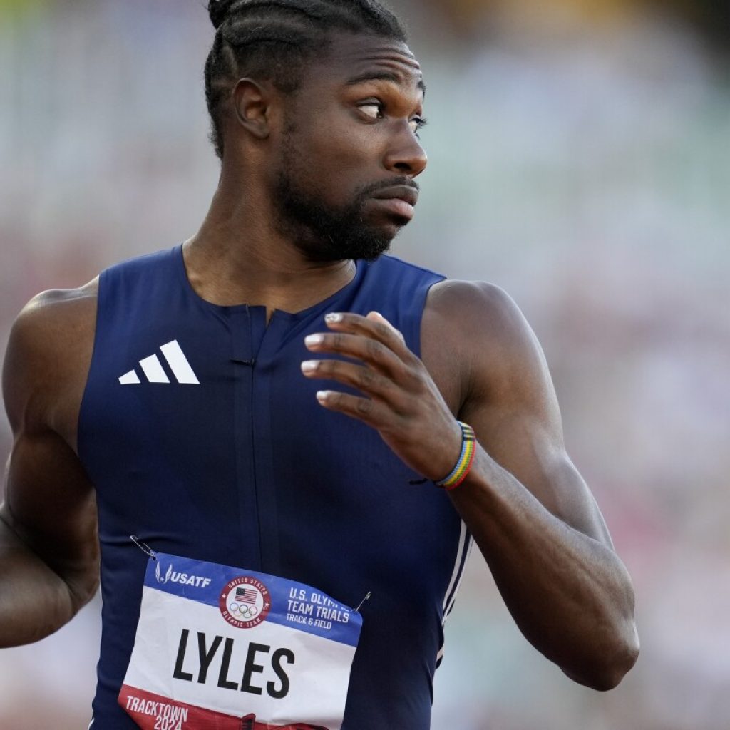 Lyles wins 200 meters to keep hope of Olympic sprint double alive for Paris