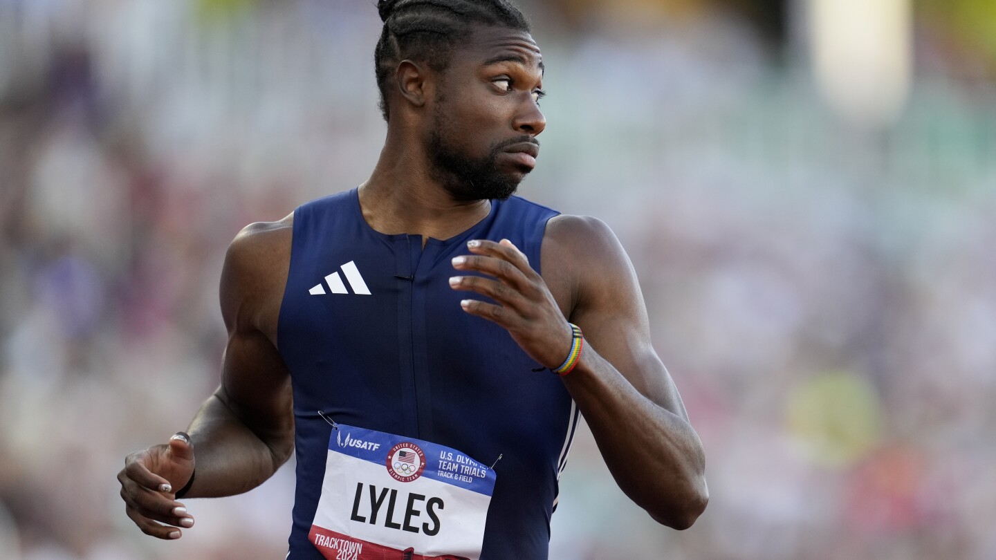 Lyles wins 200 meters to keep hope of Olympic sprint double alive for Paris