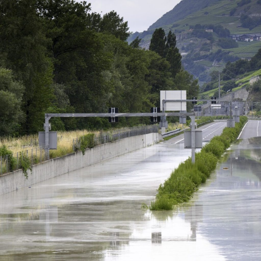 Storms in Switzerland cause flooding and a landslide that left at least 2 people dead