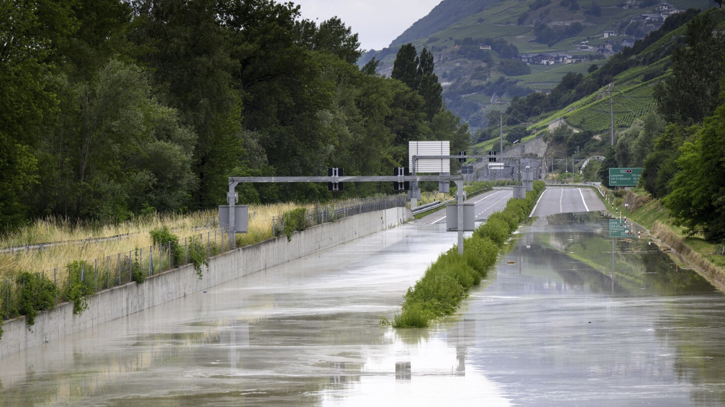 Storms in Switzerland cause flooding and a landslide that left at least 2 people dead