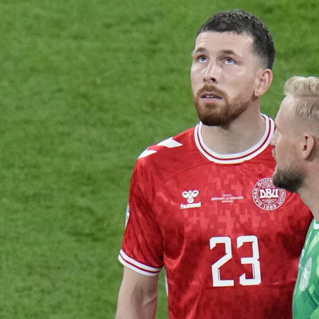 German police believe man who climbed arena roof during Euro 2024 game was a would-be photographer