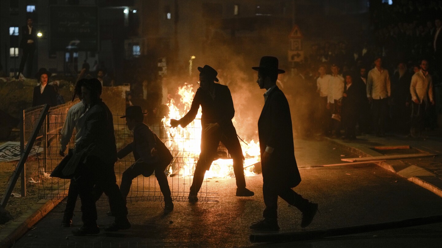 Ultra-Orthodox protest against order to enlist in Israeli military turns violent in Jerusalem