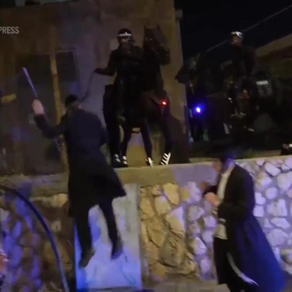 Scuffles in Jerusalem as ultra-Orthodox men protest ruling on Israel army enlistment | AP News