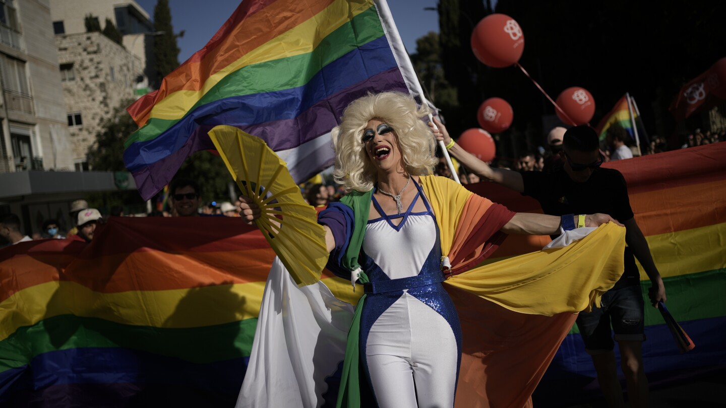 AP PHOTOS: Parties, protests and parades mark a vibrant Pride around the world