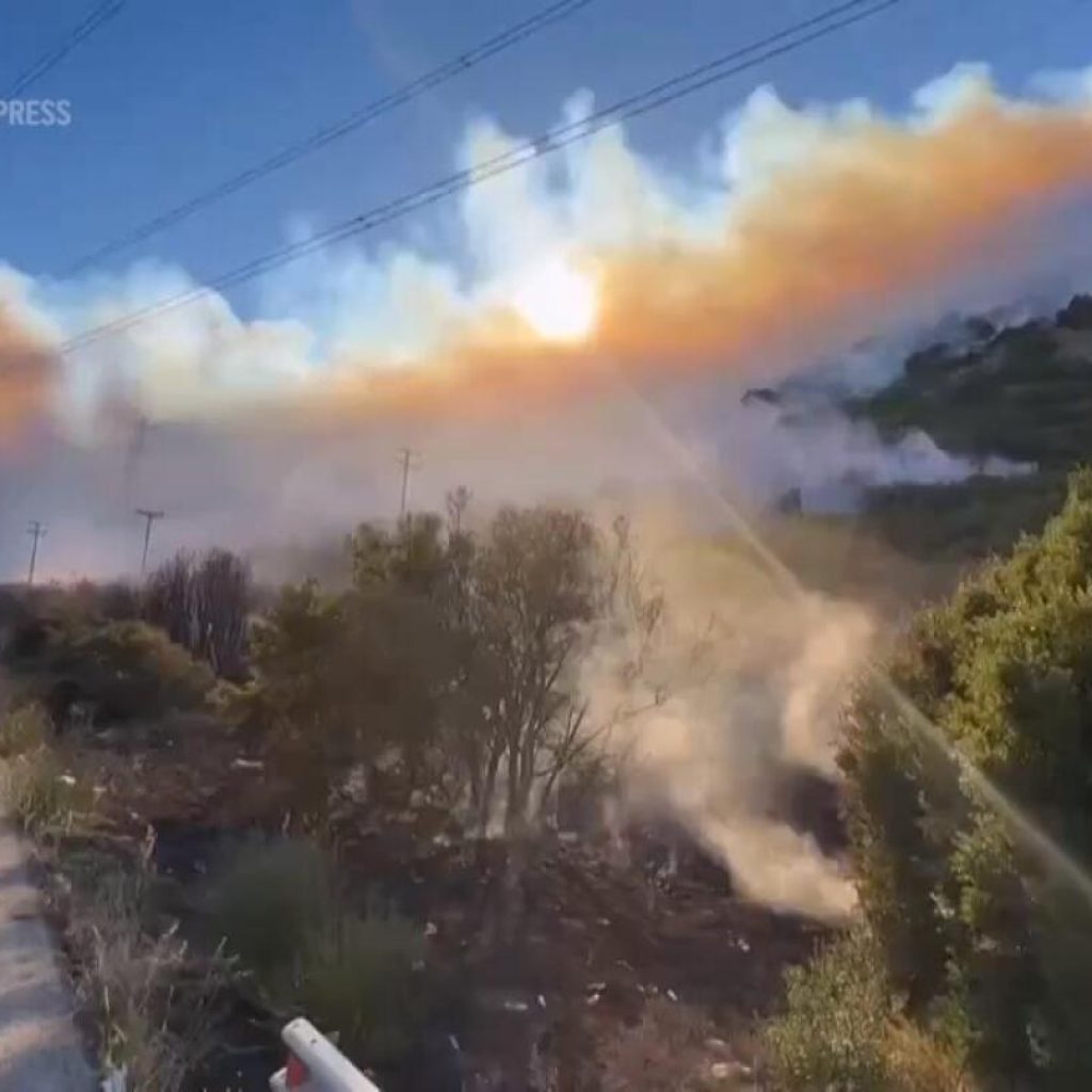 Evacuation orders in place as wildfires spread across Greece | AP News