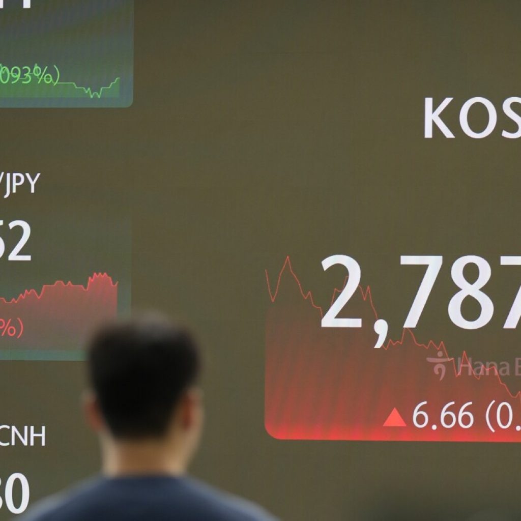 Stock market today: Asian shares mostly rise, boosted by Wall Street records as Tesla zooms