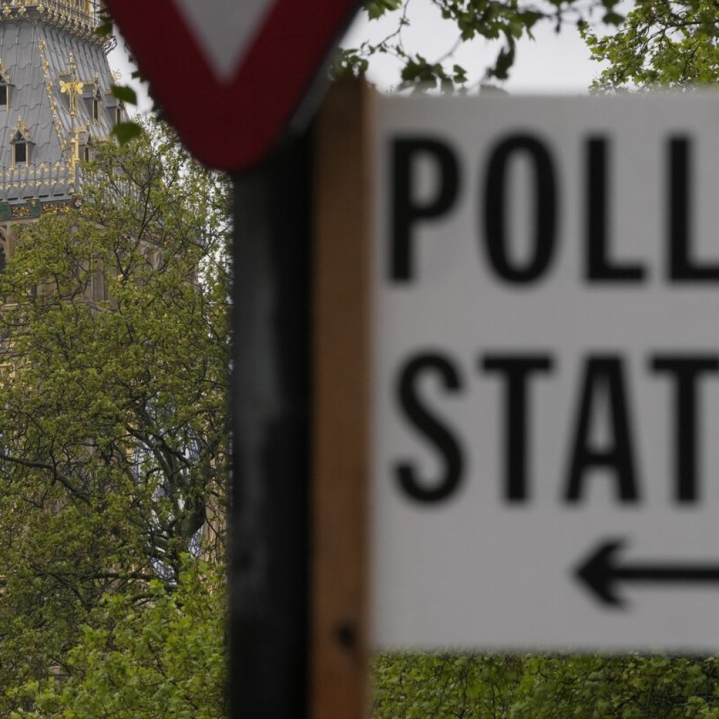 AP PHOTOS: Voters will deliver judgment on Conservative government in UK national election