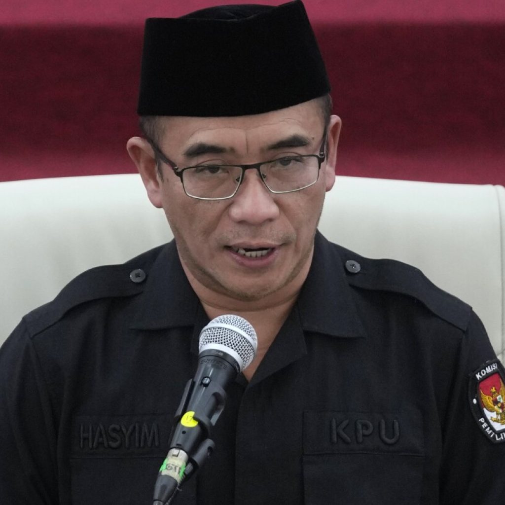Indonesia dismisses its chief election commissioner over sexual assault