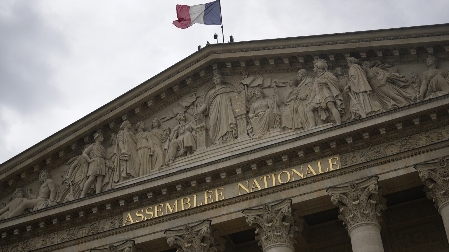 Far-right National Rally candidates, including one who wore Nazi cap, scrutinized in French election