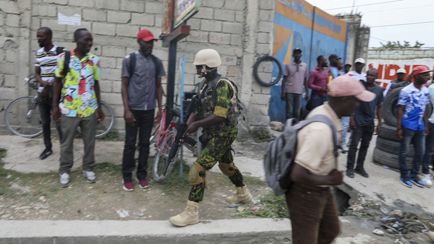 Haiti’s prime minister says Kenya police is crucial to controlling gangs, calls early days positive