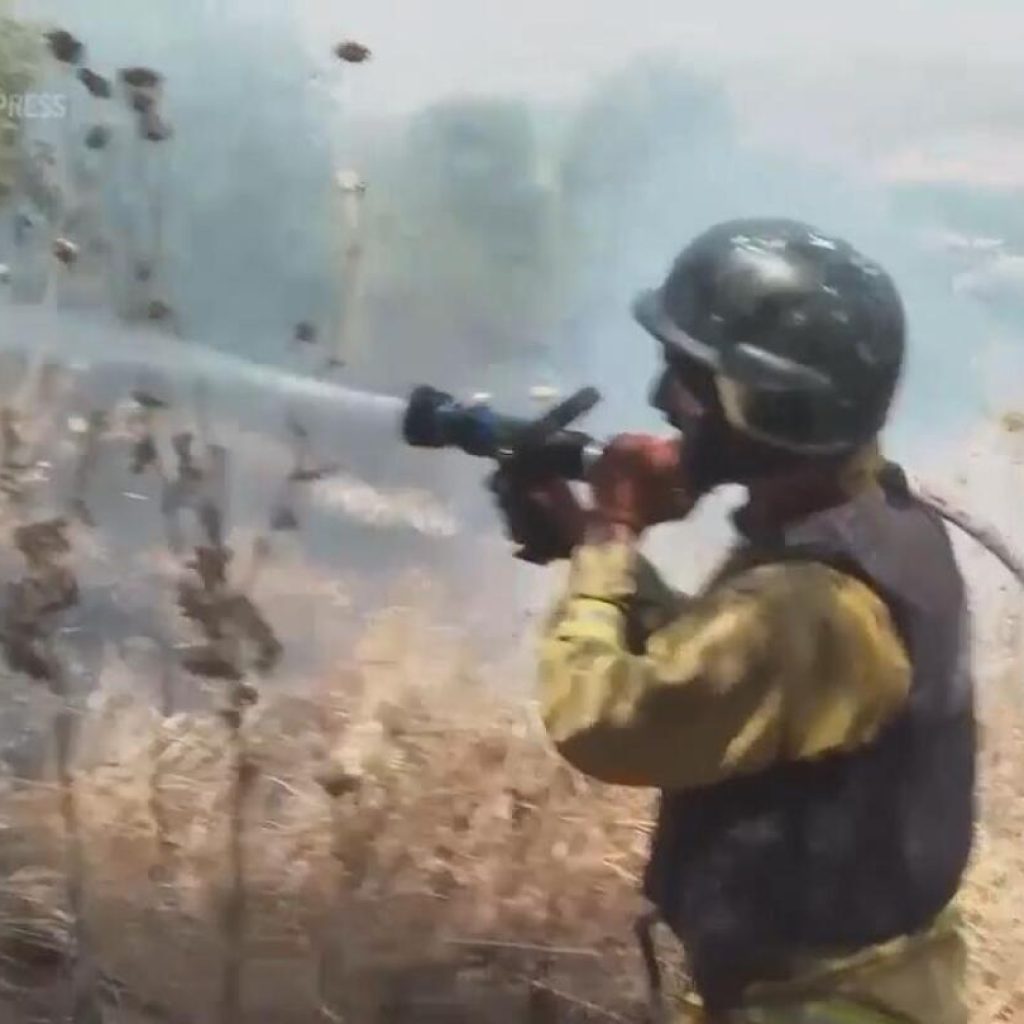 Strikes between Hezbollah and Israel spark fires on both sides of the frontline | AP News
