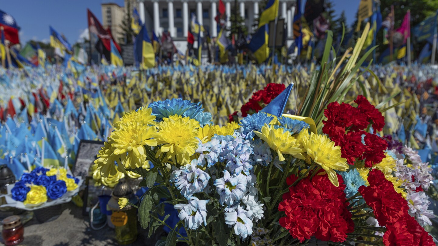 A precious moment in time of war: Flowers for a wife and daughter coming home to Ukraine