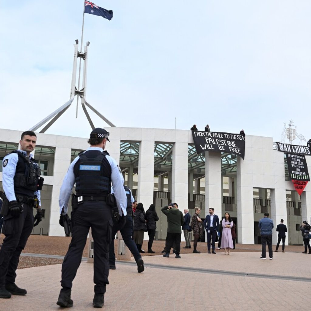 Pro-Palestinian protesters breach security at Australia’s Parliament House to unfurl banners