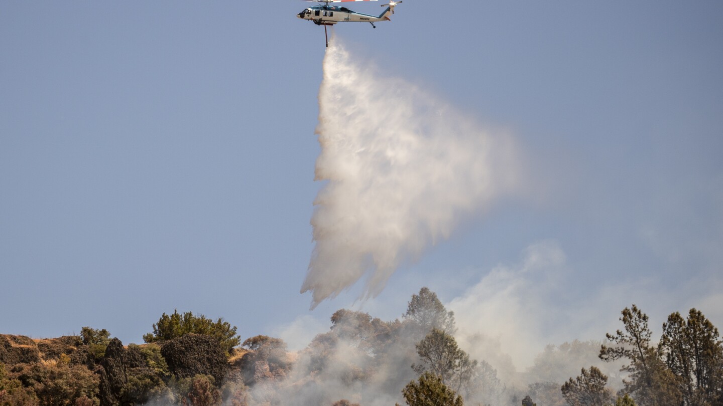 Northern California wildfire does not grow but winds and hot weather could whip up flames