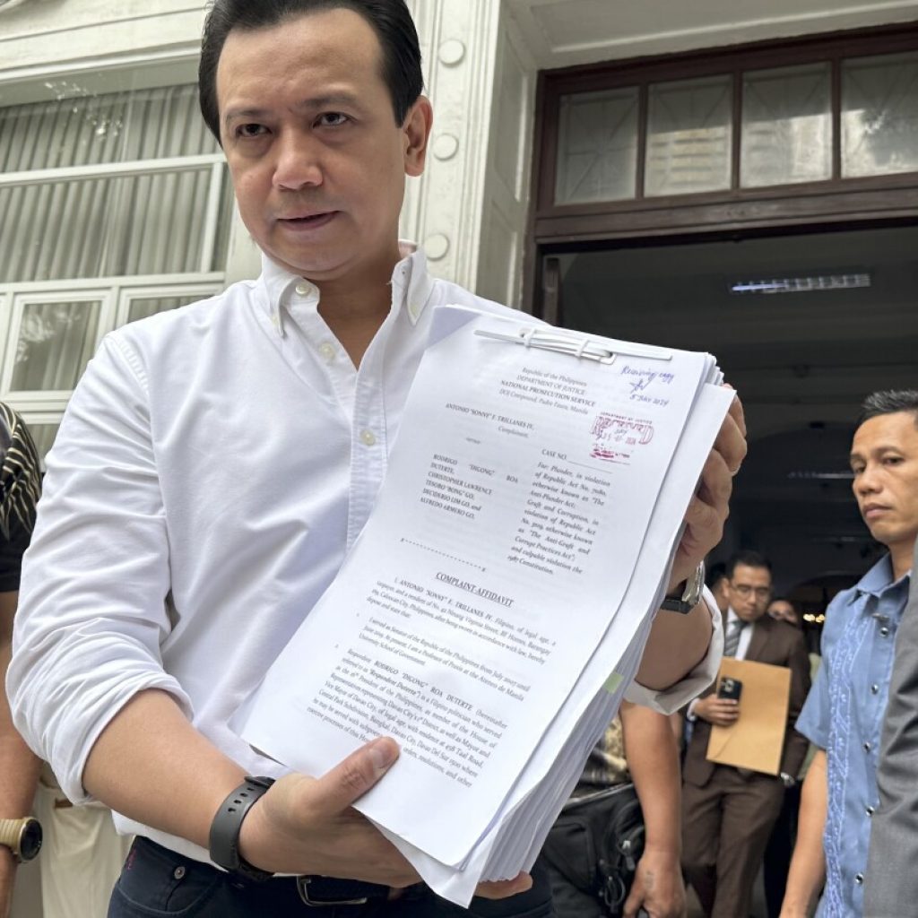 Former Philippine leader Duterte and aide accused of steering government contracts to cronies