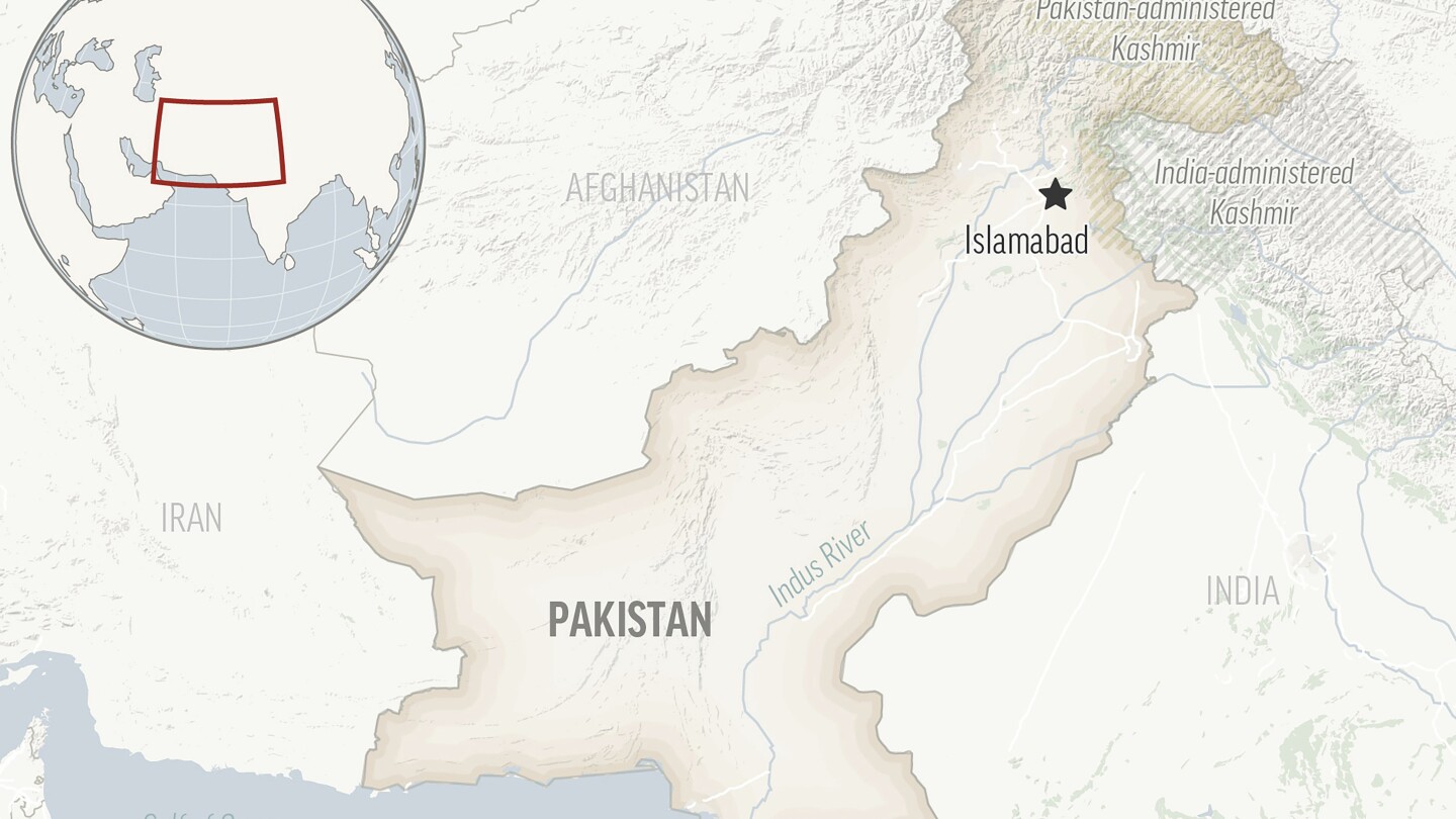 A roadside bomb planted on a bridge hits a rickshaw in Pakistan, killing 2 people and wounding 8