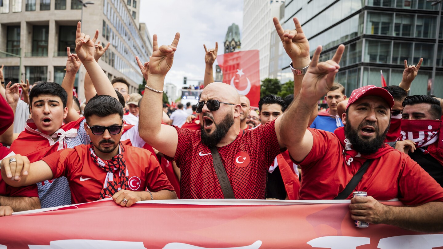 Turkey supporters make controversial hand gesture on way to stadium for Euro 2024 match