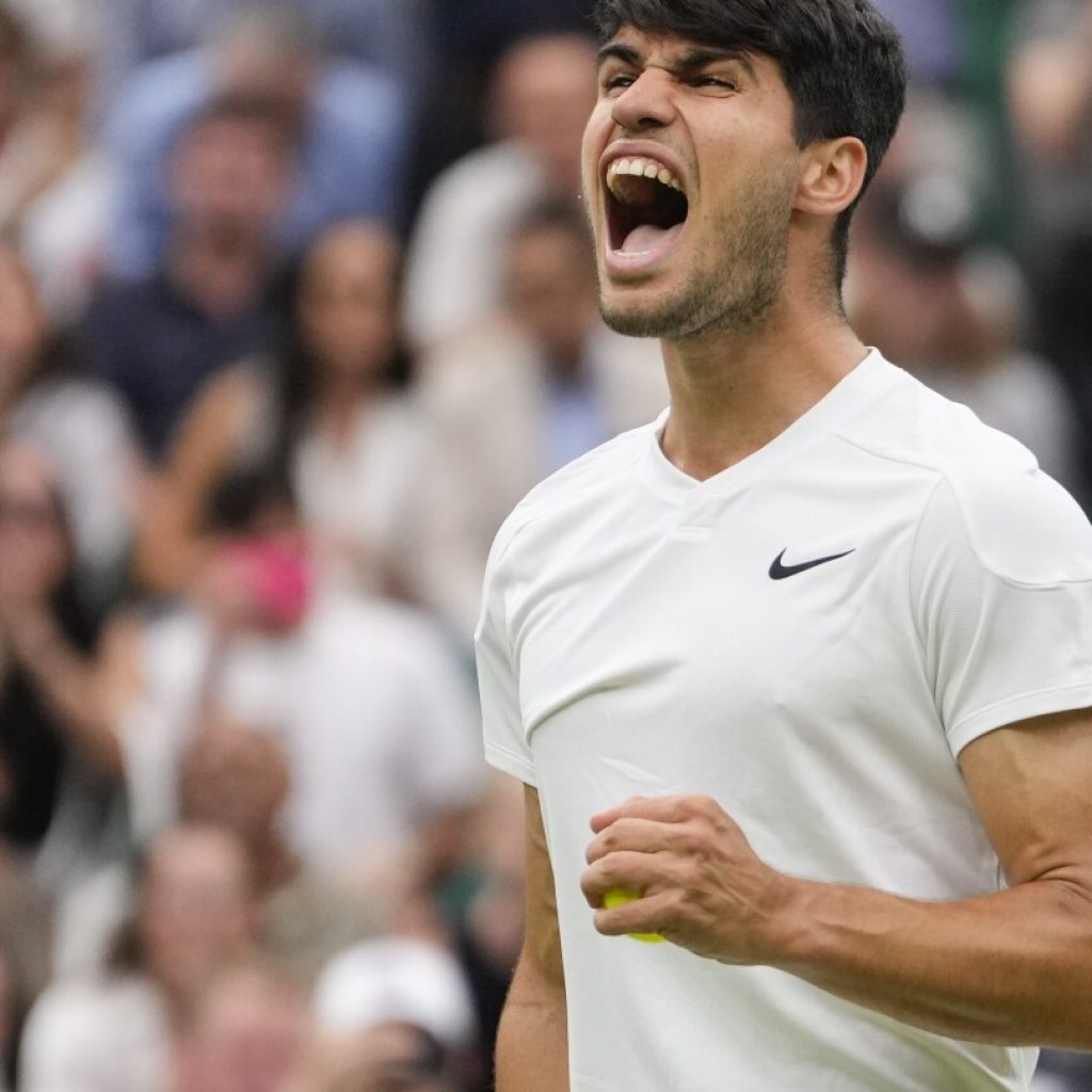 Alcaraz holds off Humbert in 4 sets to reach Wimbledon quarterfinals