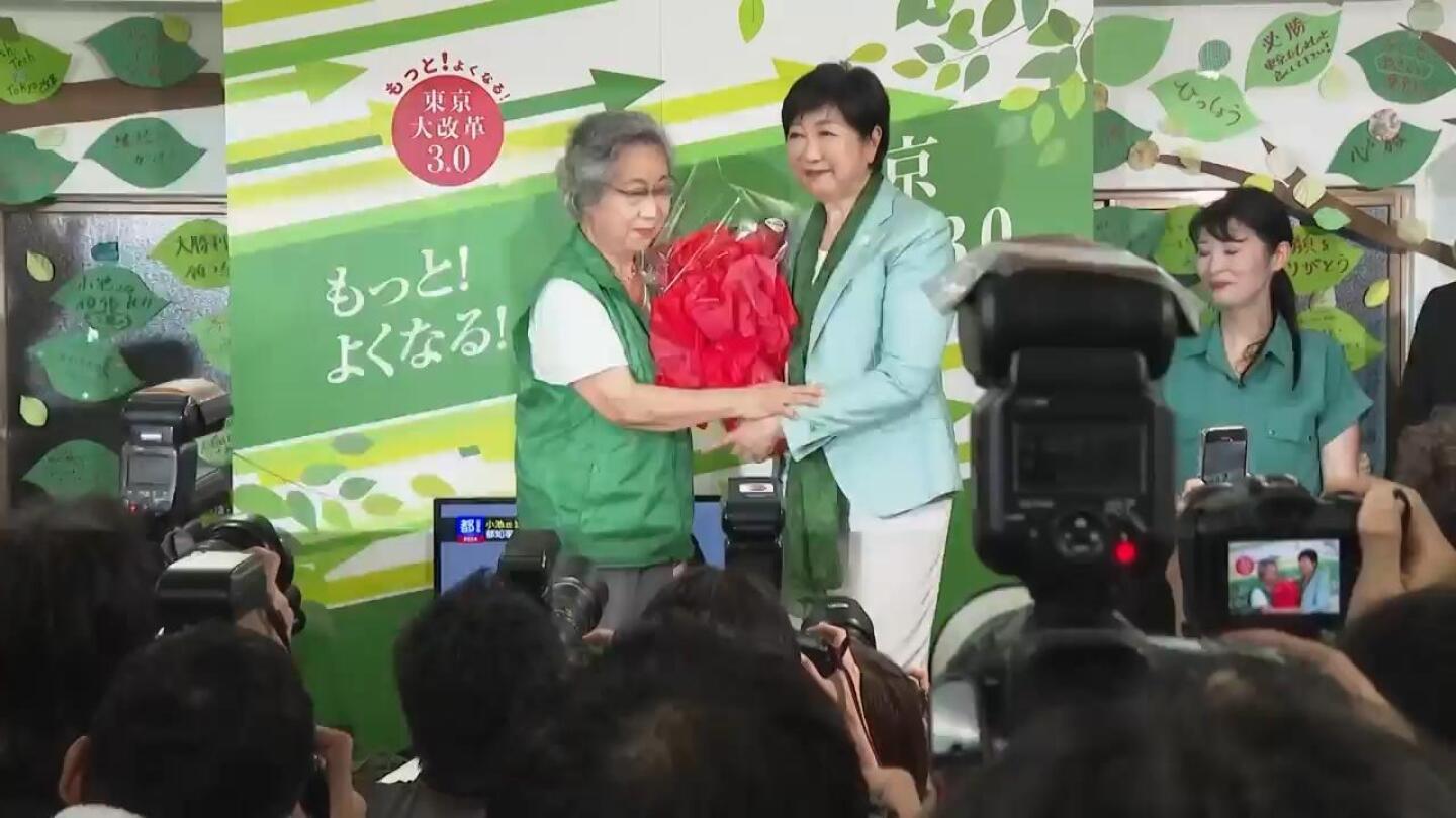 Tokyo’s incumbent Governor Koike declares victory after exit-poll projects third term | AP News