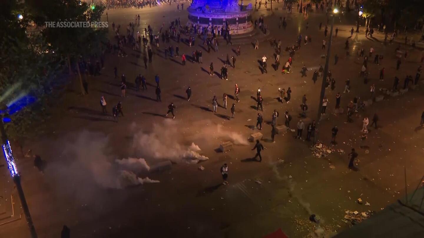 Crowds disperse after tear gas deployed at Place de la Republique | AP News