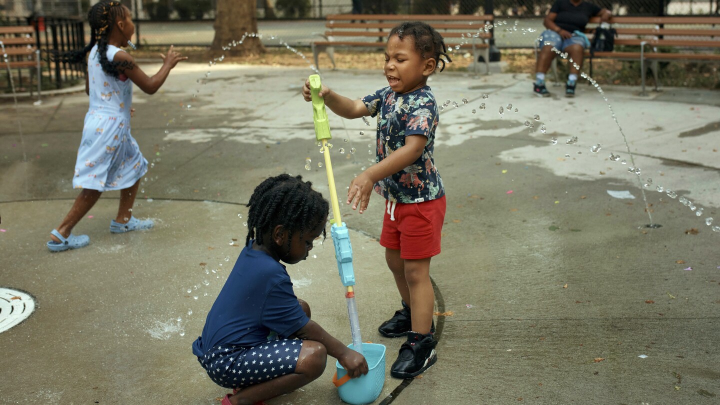 Scorched by history: Discriminatory past shapes heat waves in minority and low-income neighborhoods