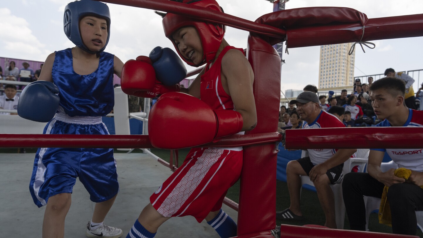 AP PHOTOS: A 12-year-old in Mongolia finds joy in boxing and now dreams of the Olympics