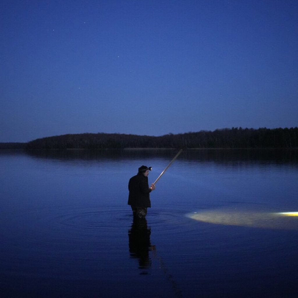 As climate change alters lakes, tribes and conservationists fight for the future of spearfishing