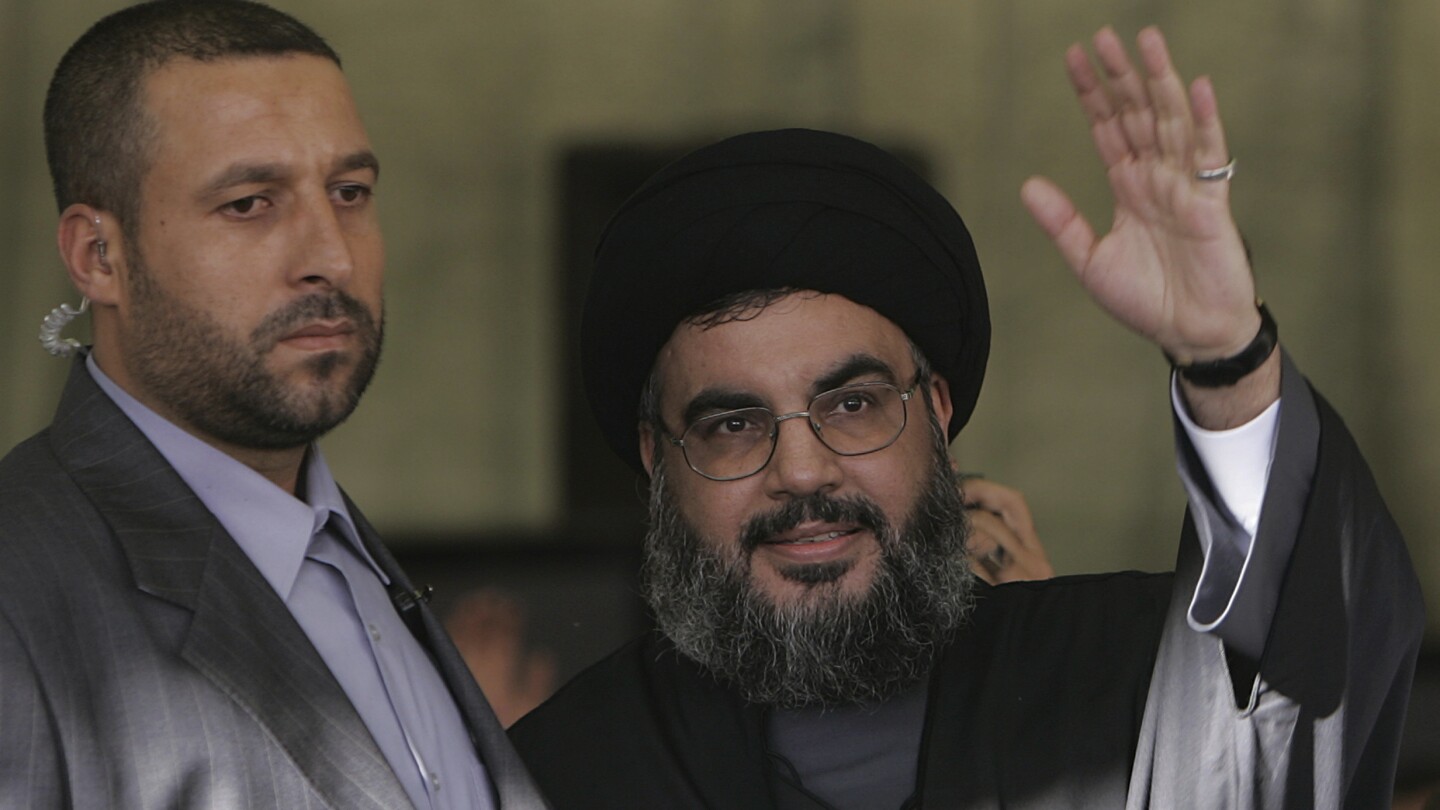 The Latest | Israeli strike kills the ex-bodyguard of Hezbollah’s top leader as tensions simmer