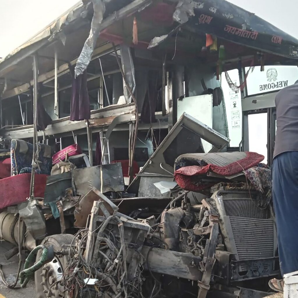 A double-decker bus collides with a milk truck in northern India, killing at least 18 people