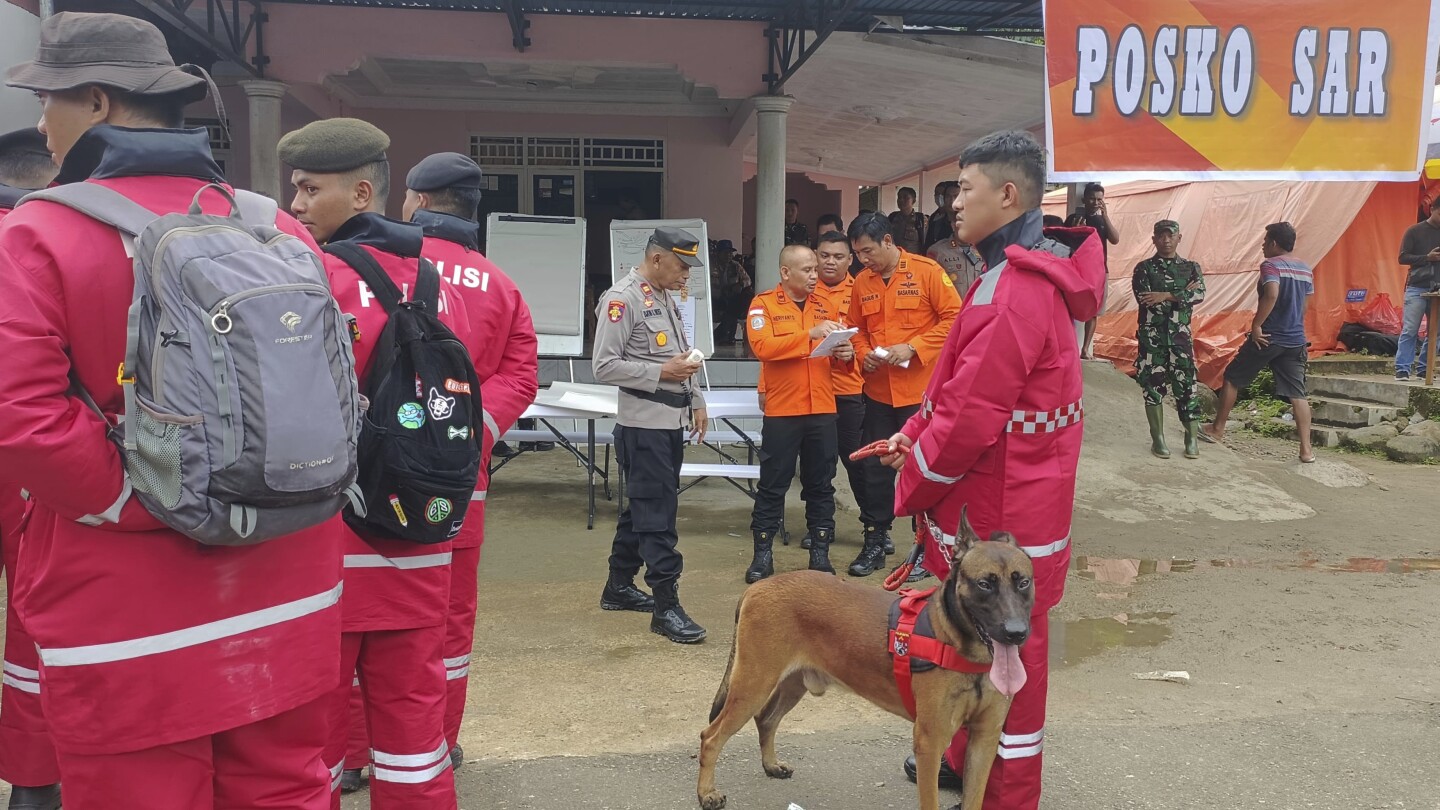 The search intensifies for dozens buried in an Indonesian landslide that killed at least 23 people