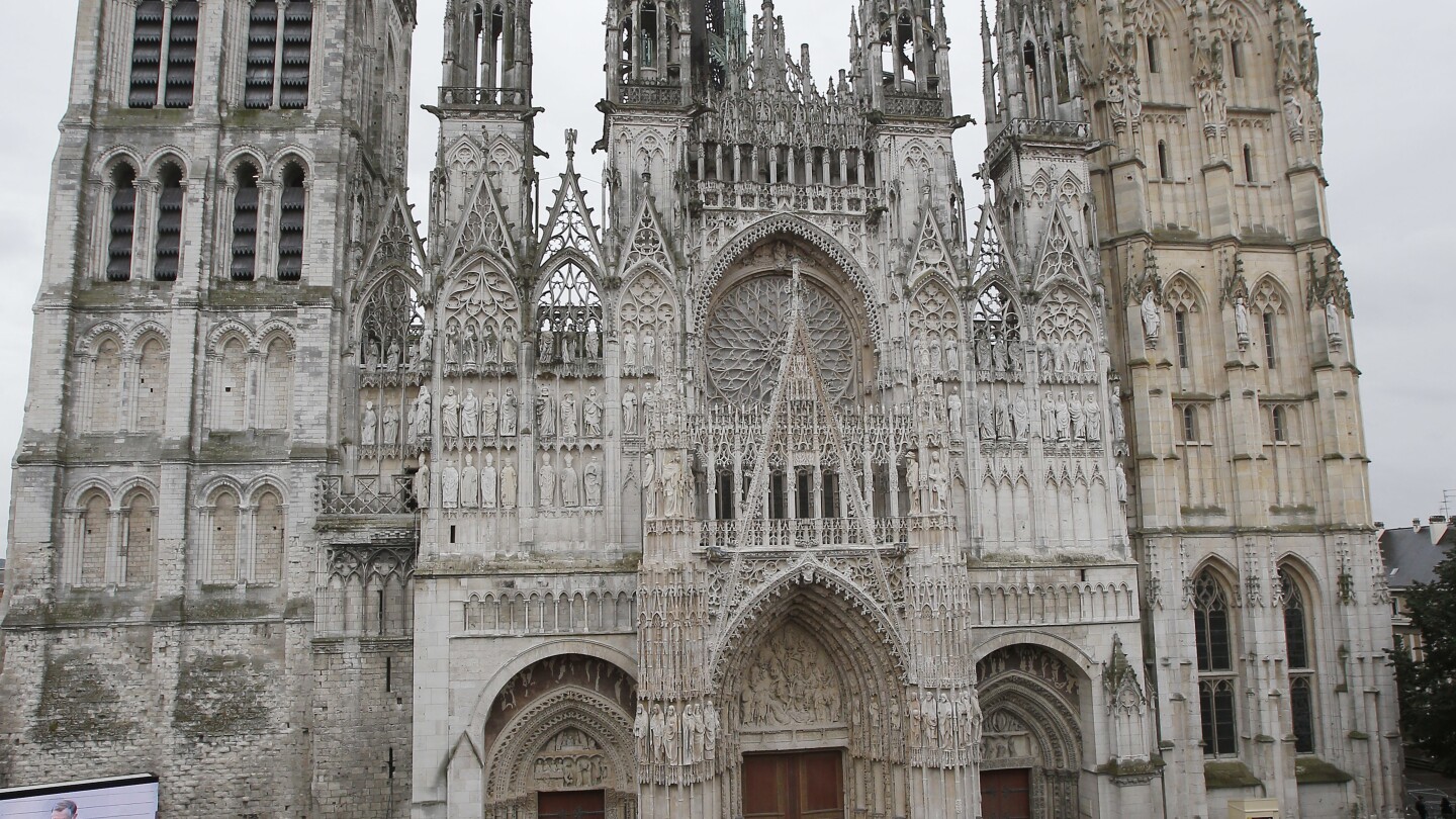 Fire breaks out in the spire of the medieval cathedral in the French city of Rouen