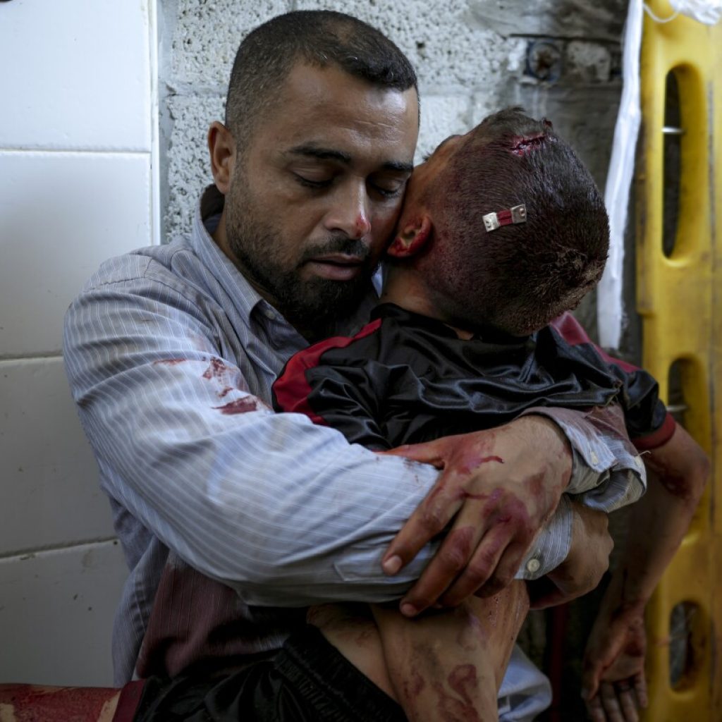 A boy in Gaza was killed by an Israeli airstrike. His father held him and wouldn’t let go