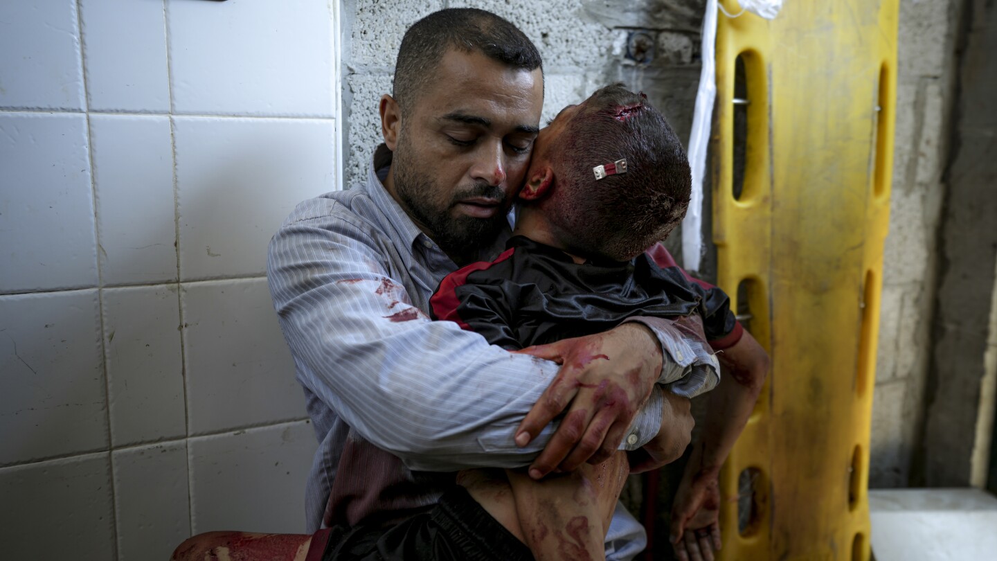 A boy in Gaza was killed by an Israeli airstrike. His father held him and wouldn’t let go