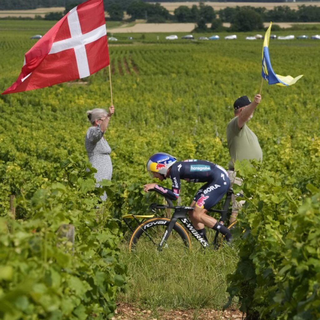 ‘Then it’s gone forever:’ AP photographers race to capture fleeting Tour de France scenes