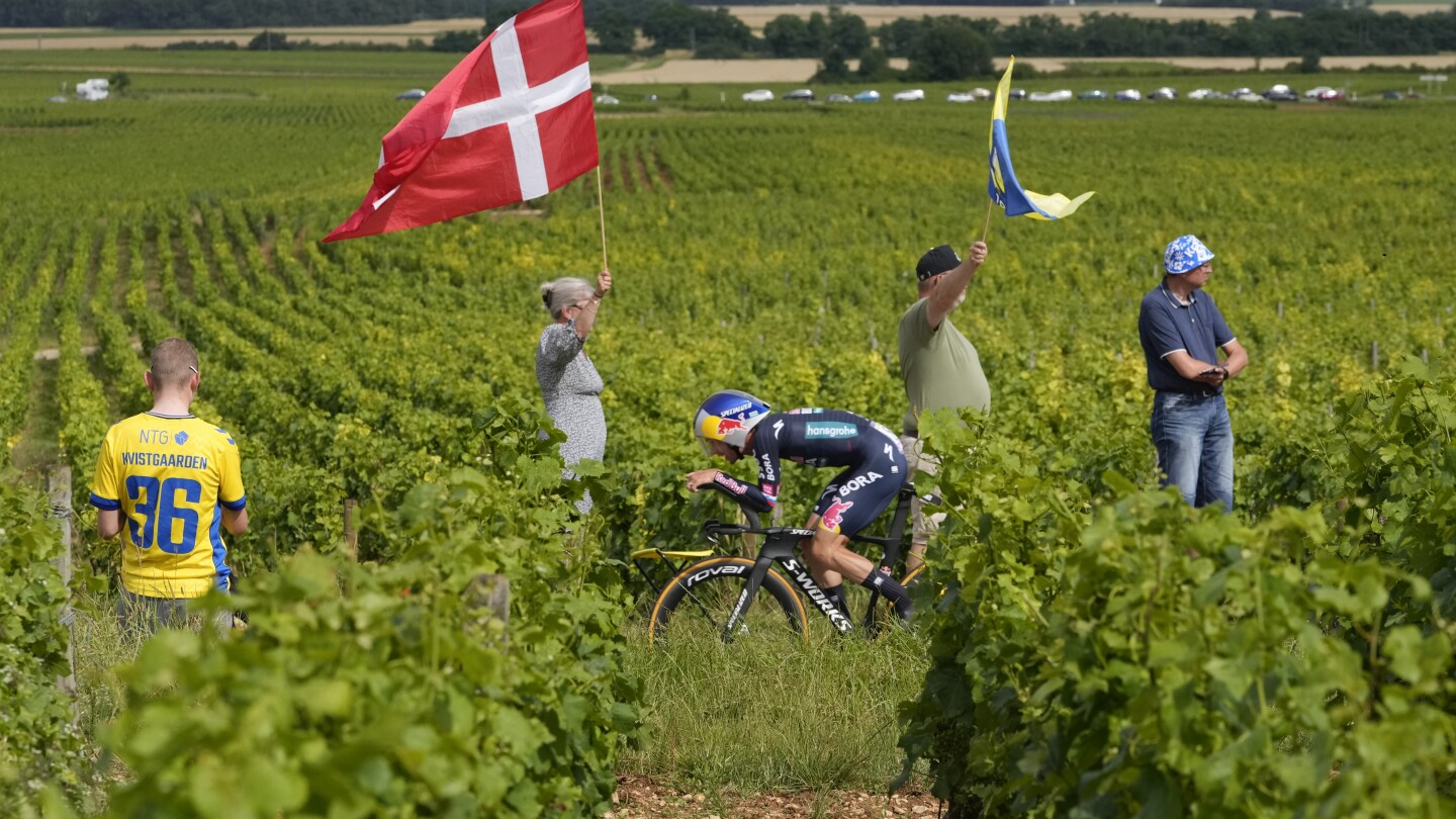 ‘Then it’s gone forever:’ AP photographers race to capture fleeting Tour de France scenes