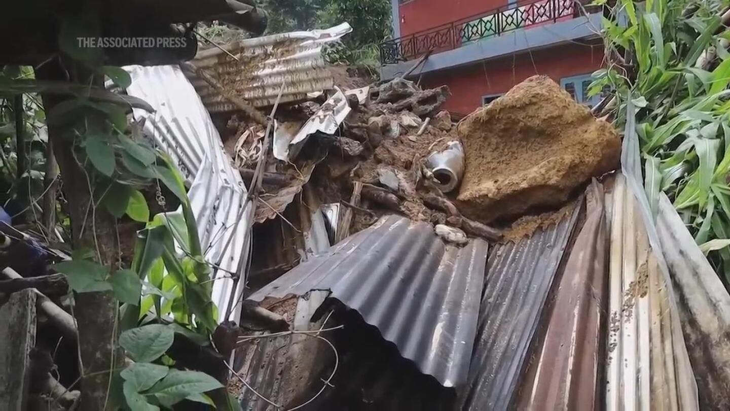 Damage after at least 60 people swept into a river by Nepal landslide | AP News